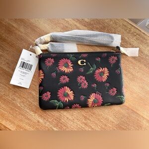 * Nwt* in original packaging Coach Flower Power Wristlet